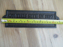 Load image into Gallery viewer, 1897 Cast Iron Sign